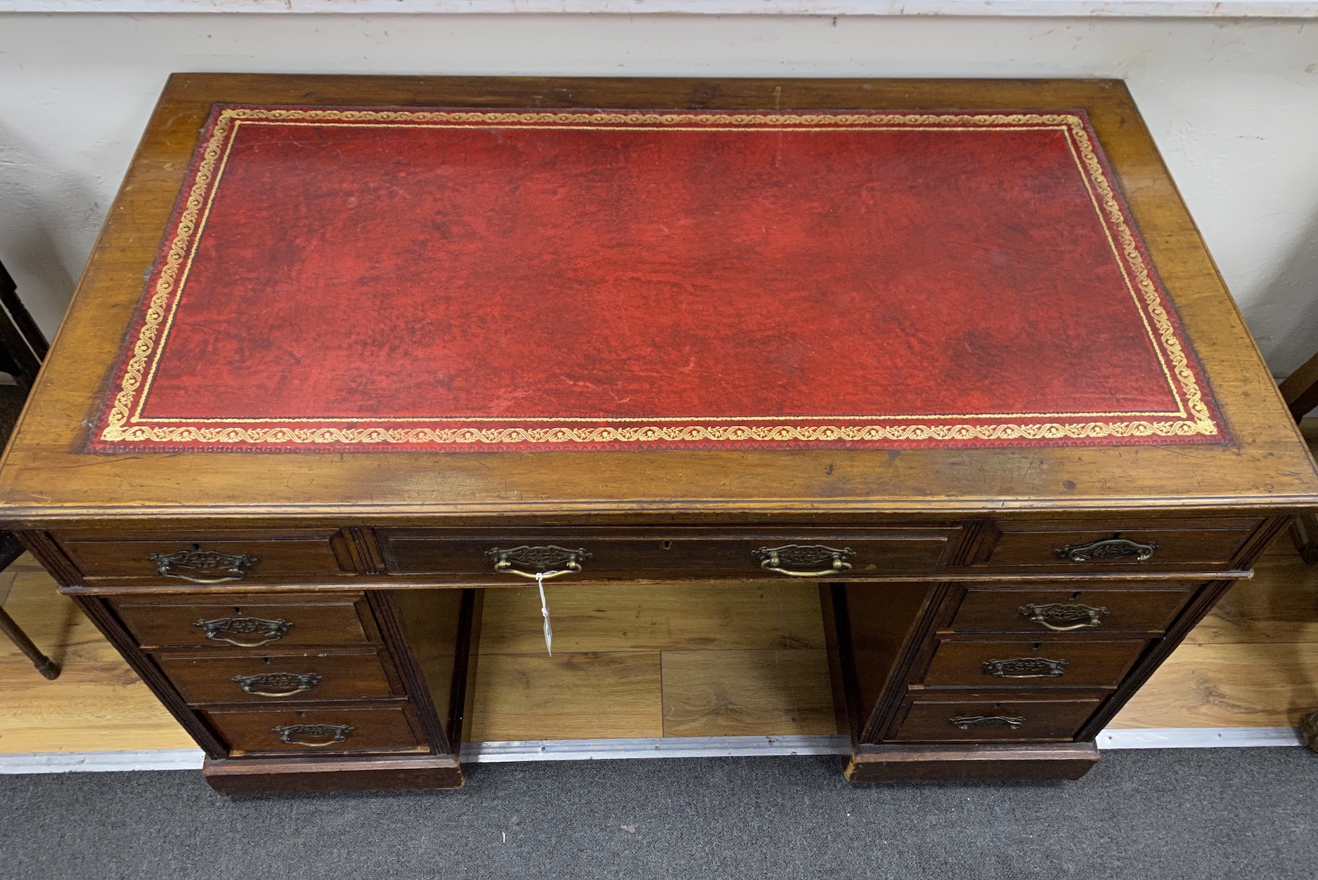 A late Victorian mahogany pedestal desk, width 122cm, depth 66cm, height 72cm